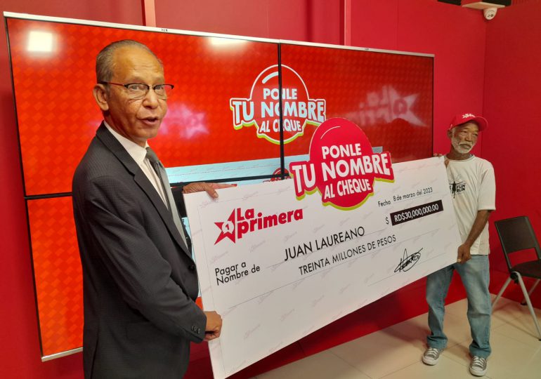 La Primera entrega 30 millones de pesos a pintor ganador del Loto 5 Más